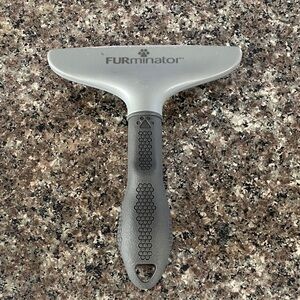 FURminator Gray and Black Grooming Tool